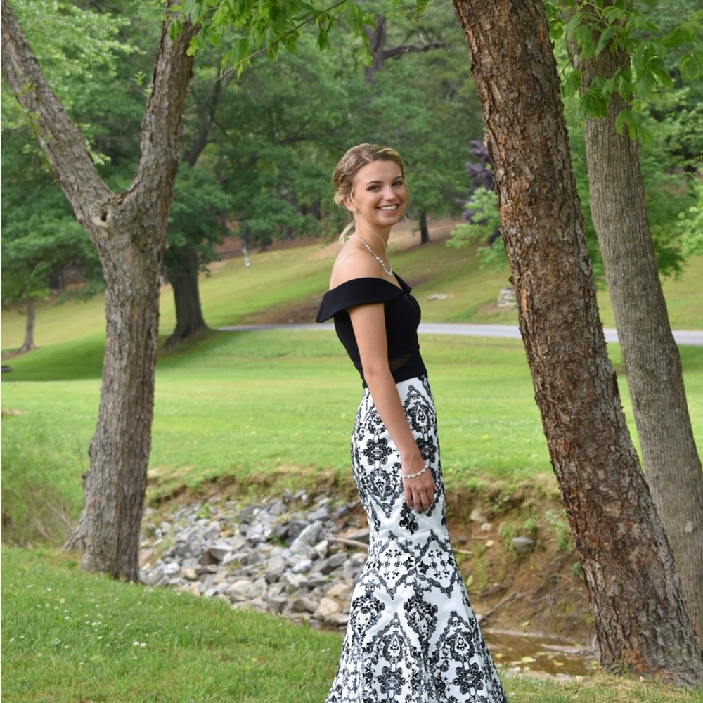 Elegant Black and White Off-Shoulder Gown